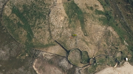 Flyfoto som viser oppsamlingsplass med reingjerder (Foto: Kartverket)