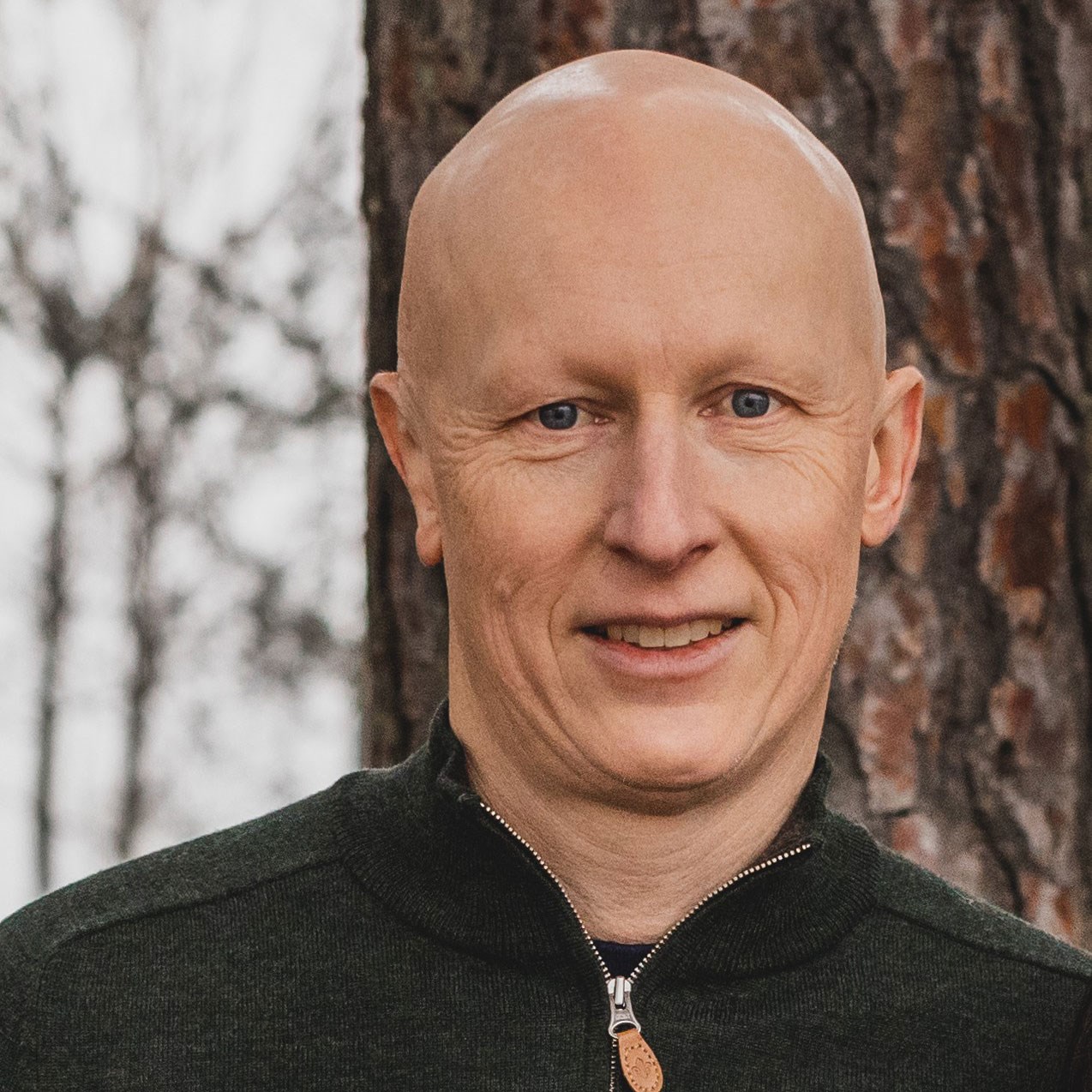 Portrettfoto av mannlig kartverks-ansatt